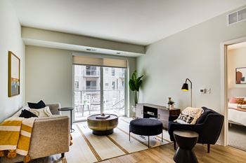 Floor-to-ceiling windows with roller shades*